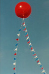 large helium balloons. red color balloon